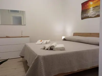 Letto o letti in una camera di La Casa di Ary alle pendici dell'Etna