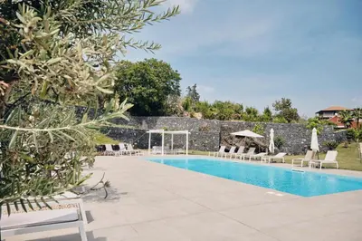 Piscina di CORTILIO Luxury Homes on Etna o nelle vicinanze