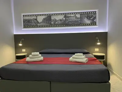 Letto o letti in una camera di Pacini 88 Rooms and apartment Catania Centro