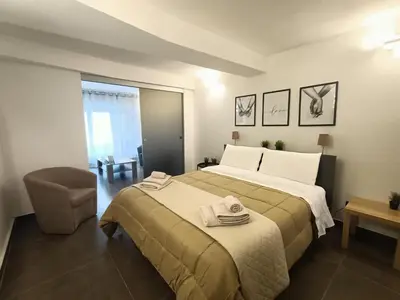 Letto o letti in una camera di Orlando Catania Luxury Open Space