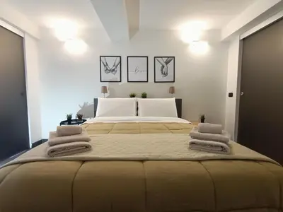 Letto o letti in una camera di Orlando Catania Luxury Open Space