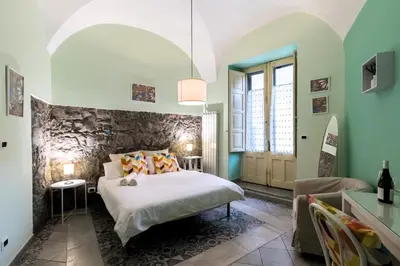 Letto o letti in una camera di Al Palazzetto di Milo