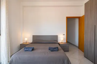 Letto o letti in una camera di Belvedere dell Etna - Ampio Appartamento con vista Mare e Taormina