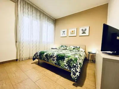 Letto o letti in una camera di Le Dimore del Corso