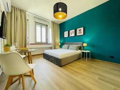 Letto o letti in una camera di Le Dimore del Corso