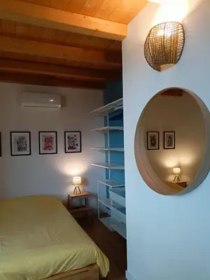 Letto o letti in una camera di Giardino Arancio - casa vacanze