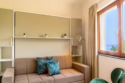 Area soggiorno di Suite Karola - Exclusive Stay