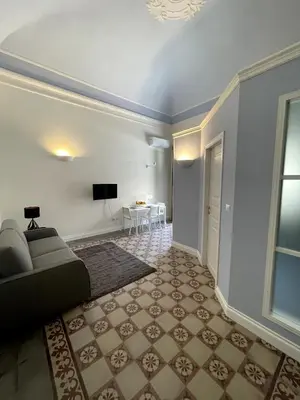 TV o dispositivi per l'intrattenimento presso Faraone Apartments