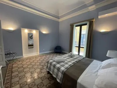 Letto o letti in una camera di Faraone Apartments