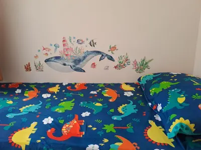 Letto o letti in una camera di Il rifugio del marinaio