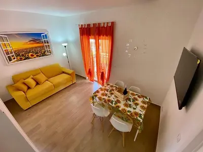 TV o dispositivi per l'intrattenimento presso Appartamento Baciata dal Sole