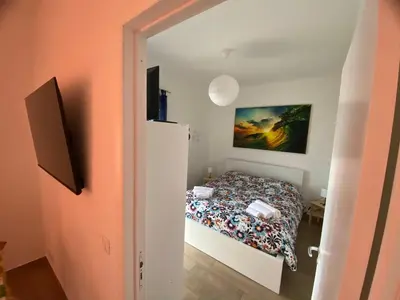 TV o dispositivi per l'intrattenimento presso Appartamento Baciata dal Sole