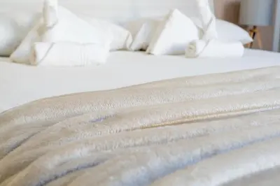 Letto o letti in una camera di Maioliche Apartment