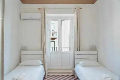 Letto o letti in una camera di Maioliche Apartment