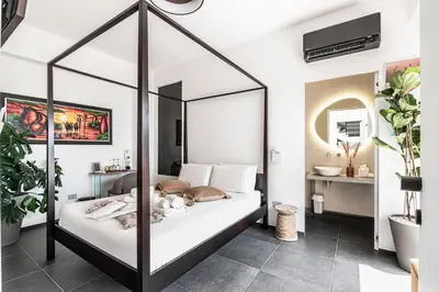 Letto o letti in una camera di Luxury B&b Euphorbia
