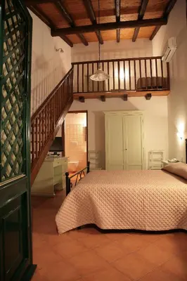 Letto o letti in una camera di Lumia