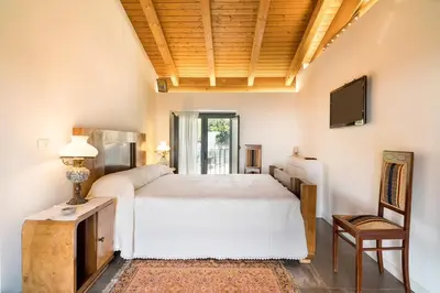 Letto o letti in una camera di Villa Oliva