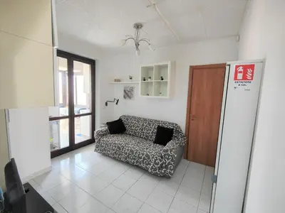 Letto o letti in una camera di Blue Garden Home Isola Bella Taormina