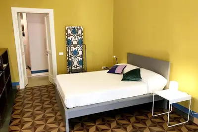 Letto o letti in una camera di Gemmellaro 32