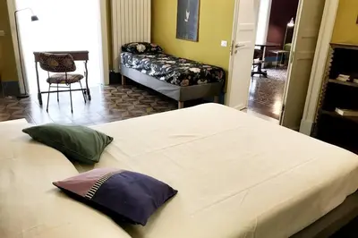 Letto o letti in una camera di Gemmellaro 32