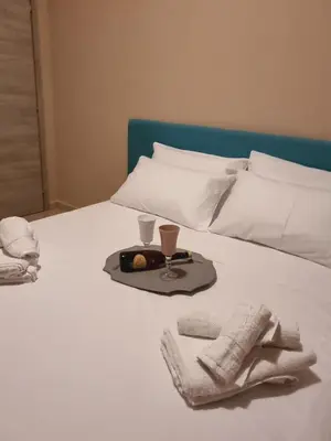 Letto o letti in una camera di STESICORO APARTMENT