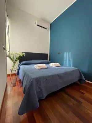 Letto o letti in una camera di Casa Elle