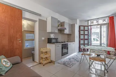Cucina o angolo cottura di GuestHost - Catania Comfy & Central Apartment x3!