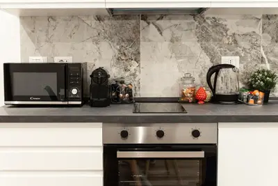 Cucina o angolo cottura di AGF Luxury Apartment