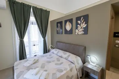 Letto o letti in una camera di CATANIA CENTER B&B