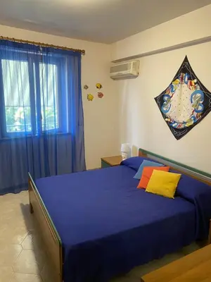Letto o letti in una camera di Casavacanze Onda Blu