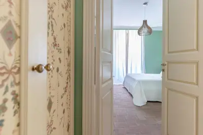 Letto o letti in una camera di Villa Rose Acireale Santa Tecla