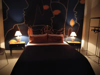 Letto o letti in una camera di Profili Siciliani B&b Ognina Catania
