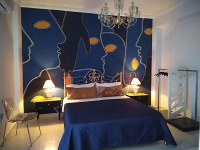 Letto o letti in una camera di Profili Siciliani B&b Ognina Catania