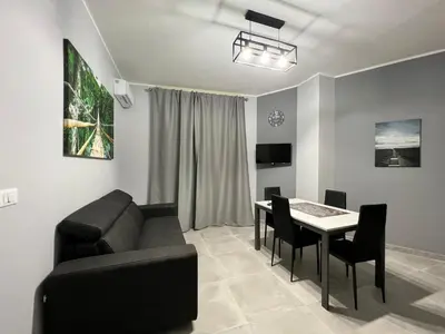 Area soggiorno di Holiday House Catania