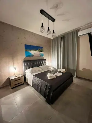 Letto o letti in una camera di Holiday House Catania