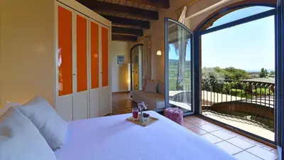 Letto o letti in una camera di VILLA BIDDIZZA 10, Emma Villas