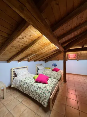 Letto o letti in una camera di La casa di Terry