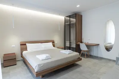 Letto o letti in una camera di CATANIA E DINTORNI LIVING ROOMS