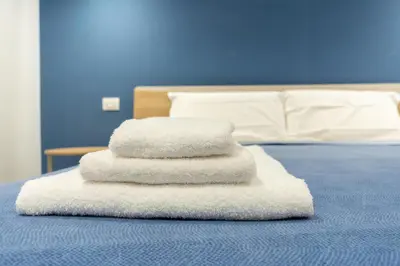 Letto o letti in una camera di CATANIA E DINTORNI LIVING ROOMS