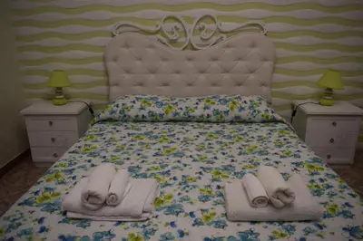 Letto o letti in una camera di Filumè Suite