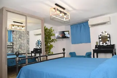 Letto o letti in una camera di Gina House