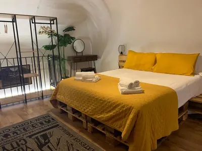 Letto o letti in una camera di Gina House