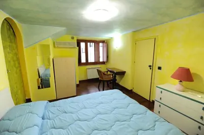 Letto o letti in una camera di MAMIS