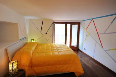 Letto o letti in una camera di MAMIS
