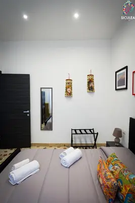 Letto o letti in una camera di Siculea Home