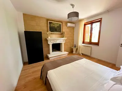 Letto o letti in una camera di Villa Asia