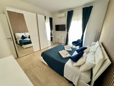Letto o letti in una camera di Gioeni Home