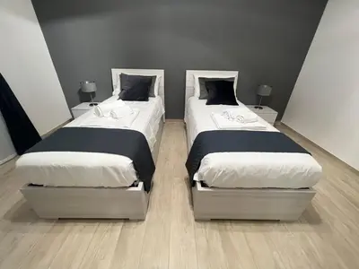 Letto o letti in una camera di Gioeni Home