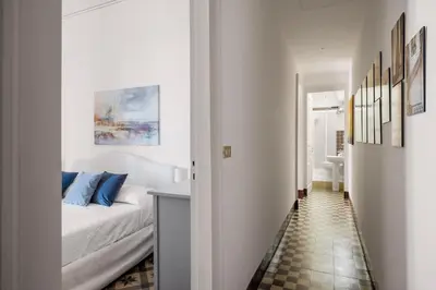 Letto o letti in una camera di Le Dimore del Corso Acireale - Sicily Stay, fra Catania, Taormina, il Mare e l'Etna