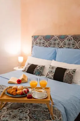 Letto o letti in una camera di Casa Bianca - Centro Città e due minuti a piedi dalla Metro